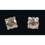 A pair of Diamond Ear Studs each claw-set brilliant-cut stone, total diamond weight 1.04cts, in 18ct