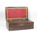 An early 19th Century military Writing Box, brass bound with fold-out writing surface and fitted