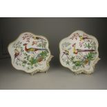 A pair of early Worcester shell shape Dishes finely painted exotic birds amongst foliage in bright