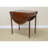 A 19th Century Sheraton style mahogany oval Pembroke Table with oval cross-banded top, fitted drawer