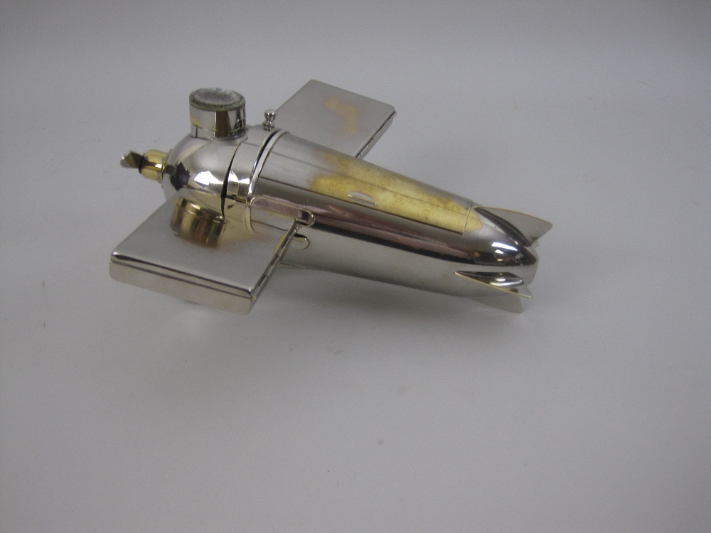 An unusual electroplated Novelty Aeroplane Smoker's Set, with match compartment and striker, - Image 8 of 11