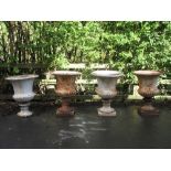 Four cast iron Garden Urns