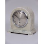 A shagreen cased Mantel Clock with circular dial marked with arabic numerals, 6in H