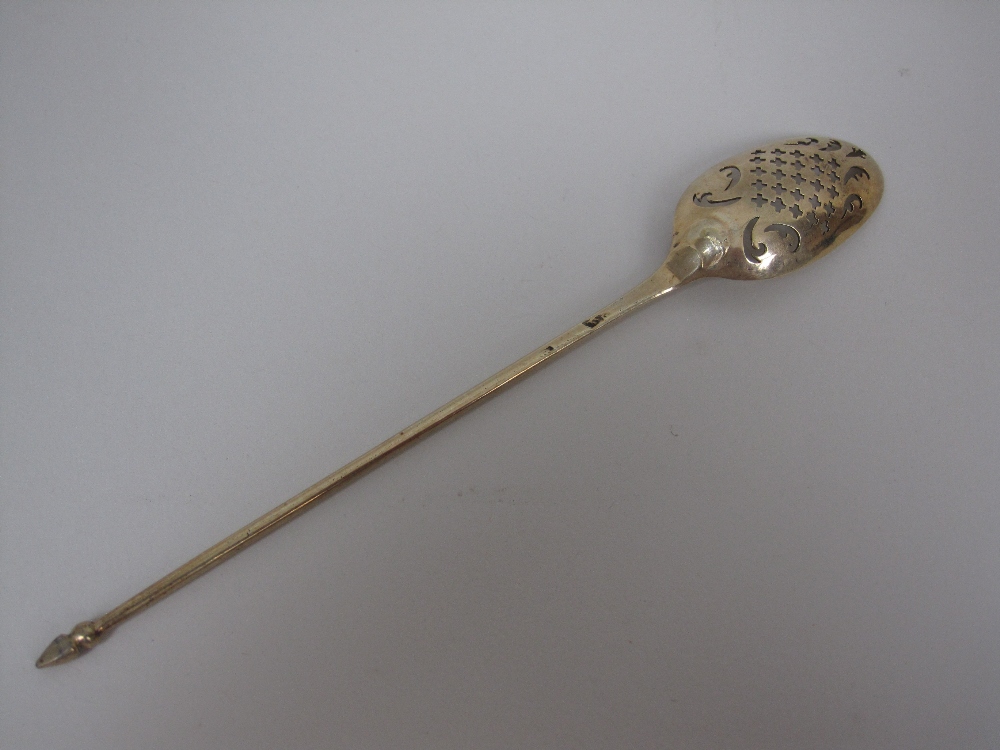 An 18th Century silver-gilt Mote Spoon with saltire cross and scroll piercing, engraved crest and - Image 2 of 5