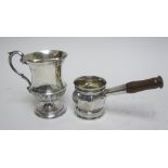 An Edward VII silver Christening Mug, semi-fluted, scroll handle on pedestal base, Chester 1904, and