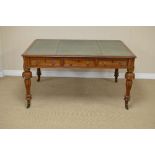 A 19th Century mahogany Library Table, the leather inset rectangular moulded top above six frieze