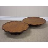 Two Victorian oak Lazy Susans with shaped rims on turned bases, 20in