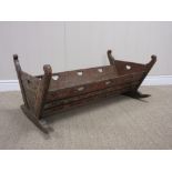 A 19th Century painted pine Cradle with floral friezes, 2ft 11in