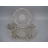 A Belleek porcelain cream latticework oval Basket with floral encrustation, 12in, a circular Belleek