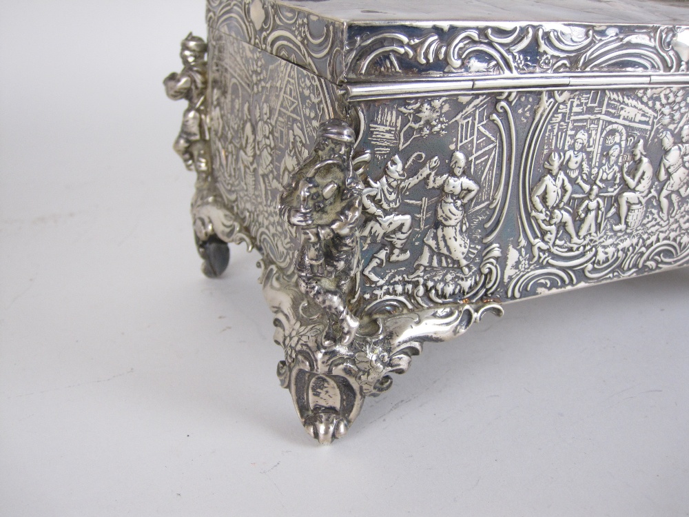 A Continental silver Casket embossed with figures merrymaking, cast figure musicians to the corners, - Image 4 of 5