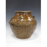 A Southeast Asian Martaban earthenware Jar, probably Philippines, c. 17th/18th Century, caramel