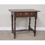 An 18th Century oak Side Table with moulded top above a frieze drawer on baluster turned supports