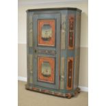 A 19th Century Continental painted pine Armoire with single door painted panels of flowers with