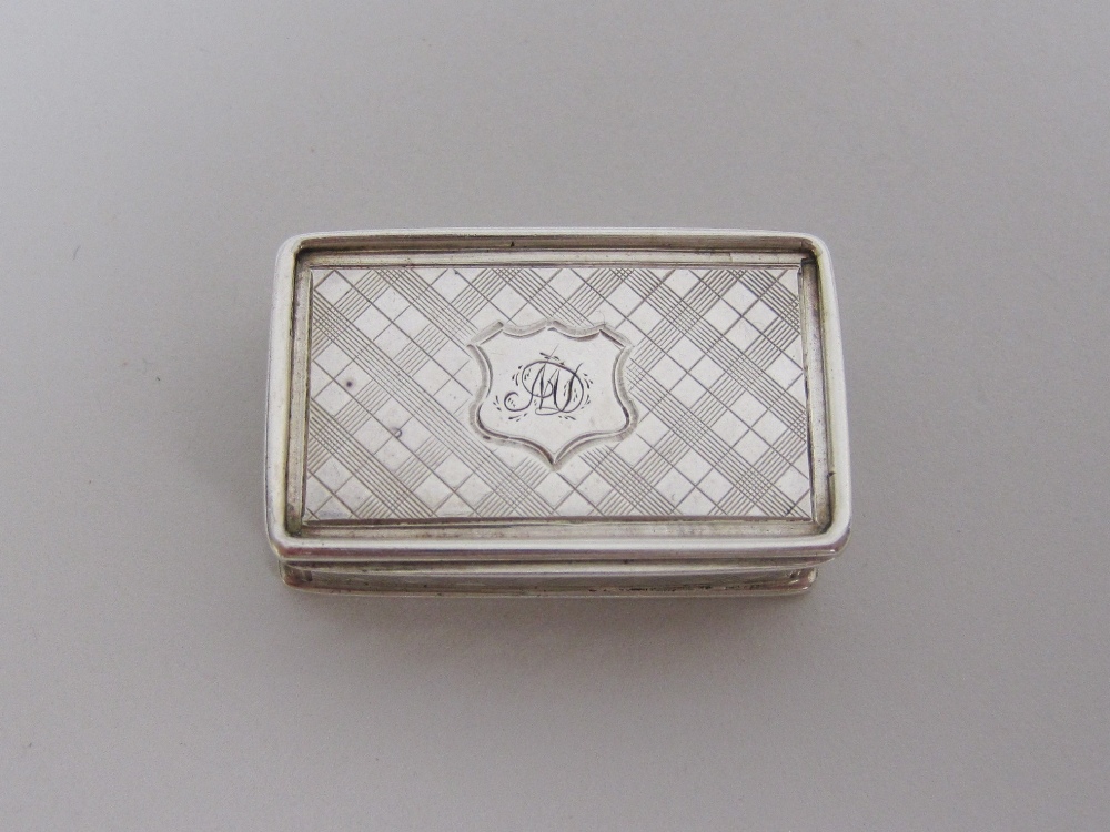 A Victorian silver rectangular Vinaigrette with trellis engraving, shield cartouche engraved