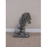 A Garden Figure of seated Lion with raised paw on rectangular base, 2ft 2in