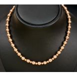 A gold bead Necklace, stamped 9c, approx 20gms