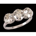 A Diamond three stone Ring claw-set old-cut stones, estimated total diamond weight 3.00cts, ring