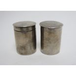 A pair of Georgian silver Wafer Boxes and Covers of plain cylindrical form, Birmingham 1812,