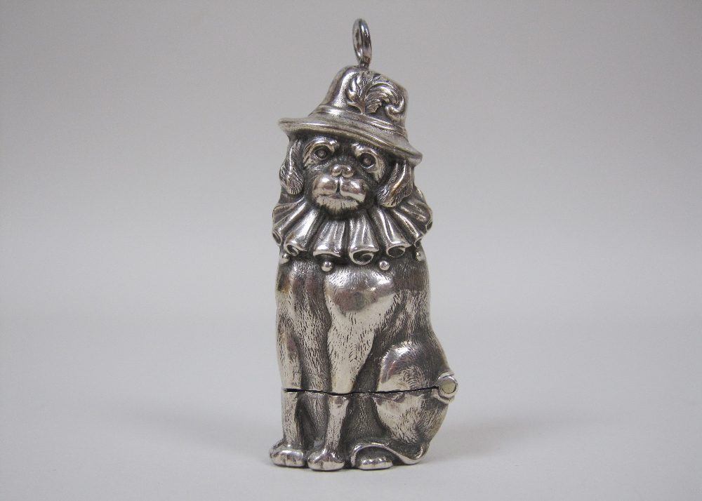 A modern silver Vesta Case in the form of a seated Spaniel with ruff, Birmingham 1979