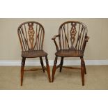 A Set of eight 19th Century Windsor Wheelback Dining Chairs in yew, elm, fruitwood, etc, with