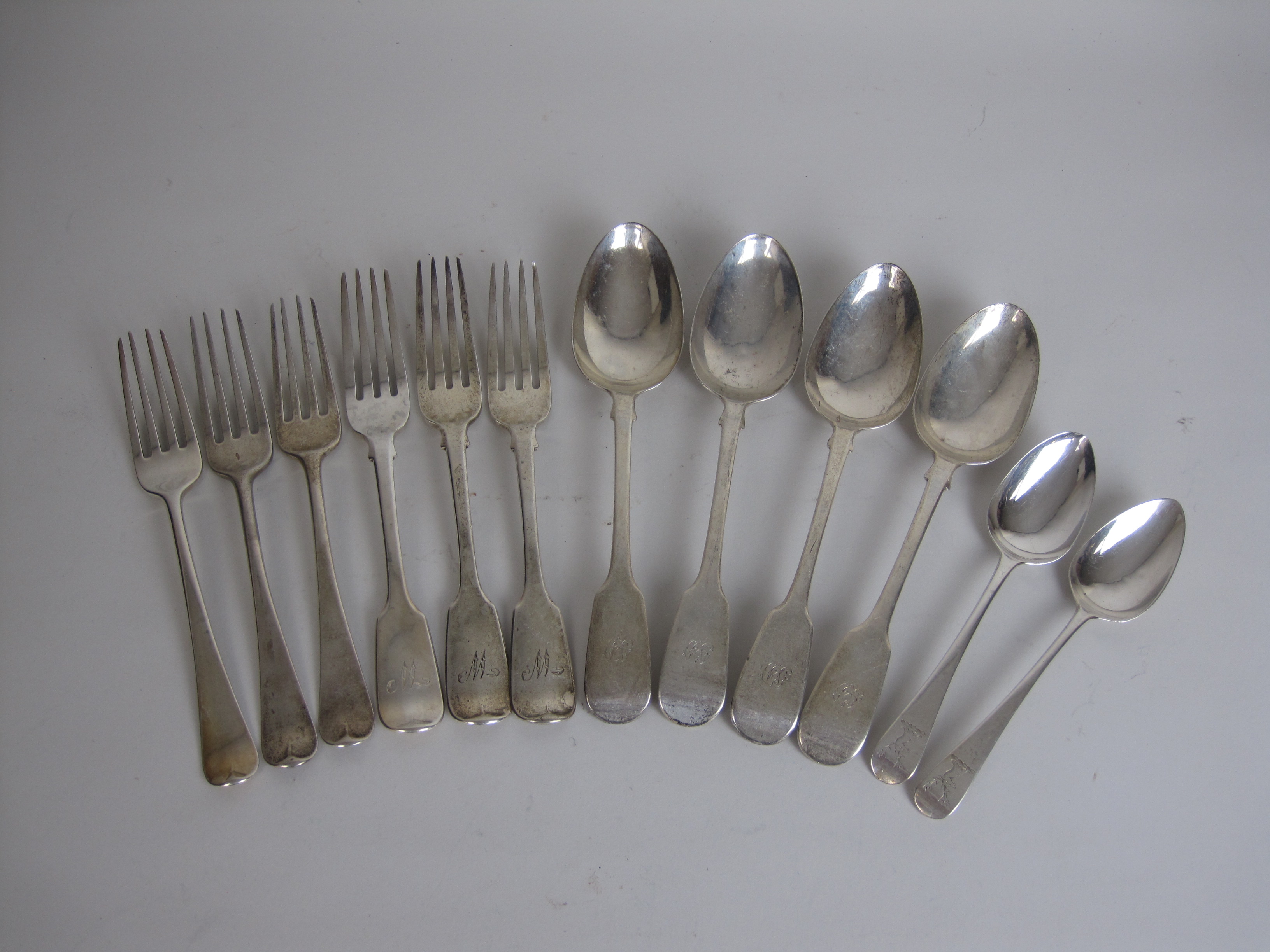 A quantity of 19th Century silver Cutlery, viz:4 fiddle pattern Table Spoons, London 1836/383 fiddle