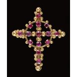 A Ruby Cross Pendant/Brooch claw-set round stones throughout in 18ct gold