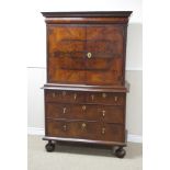 An early18th Century walnut Collector's Cabinet on Chest fitted cushion drawer above a pair of