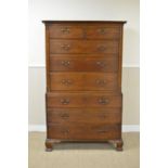 An 18th Century oak Chest on Chest with dentil frieze above two short and six long graduated drawers