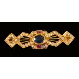 A yellow metal Diamond, Sapphire and Ruby Brooch, stamped '750', approx 4g