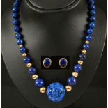 A Lapis Lazuli and gold Necklace, the front with carved puzzle ball together with a pair of Lapis