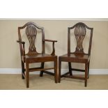 A Set of seven 19th Century oak Dining Chairs with pierced splats, solid seats on square tapering