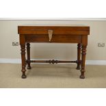 A Victorian walnut Bagatelle Table with cross-banded fold-over top enclosing baize lined interior