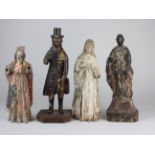 Four Philippines/Spanish Colonial carved wood Santos, comprising the Madonna, San Roque, Santa Rita,