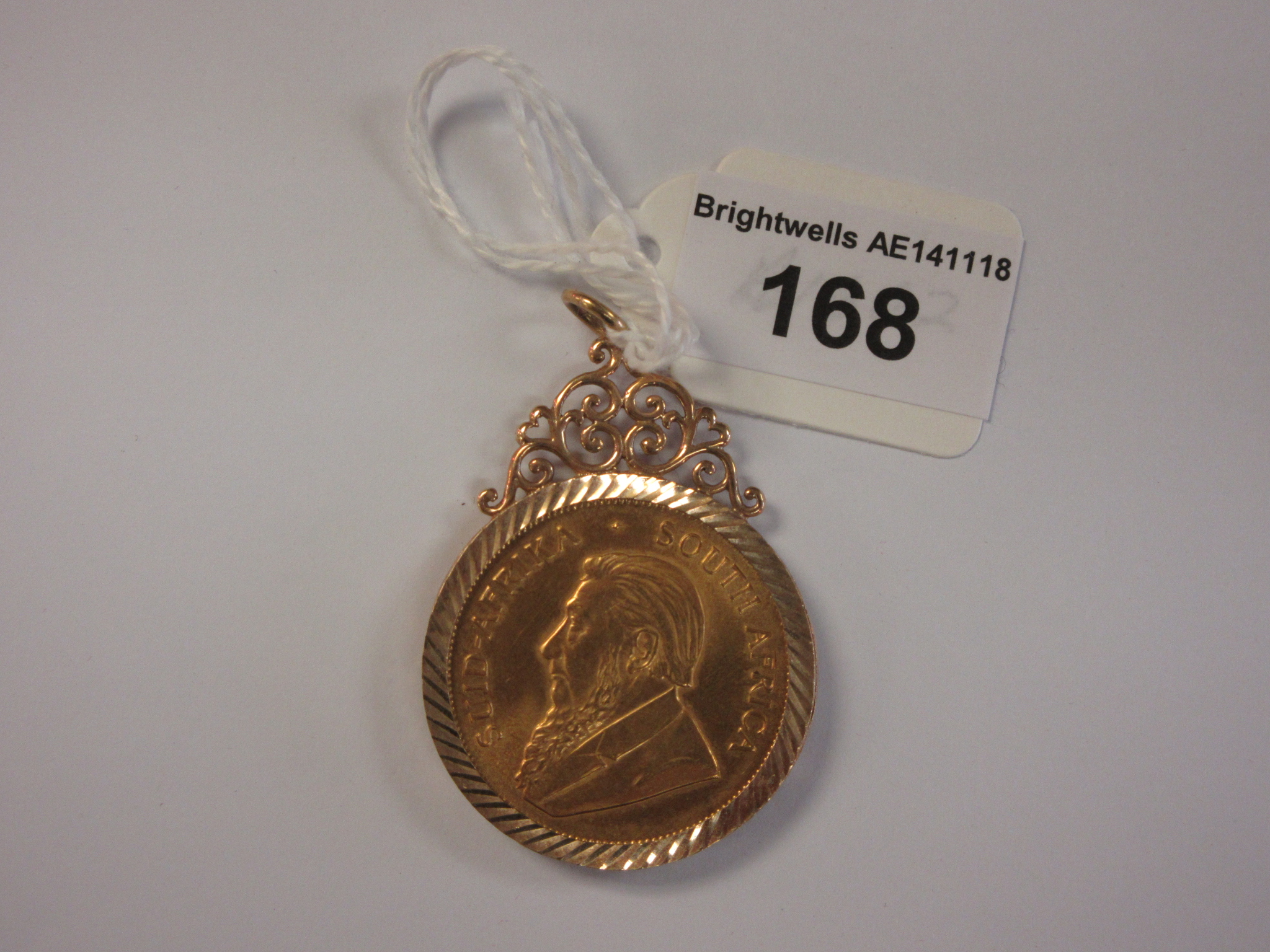 A 1975 Krugerrand in 9ct gold pendant mount, approx 40gms all in - Image 2 of 2
