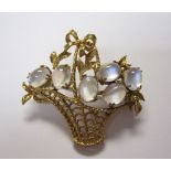 A Moonstone Flower Basket Brooch claw-set six oval cabochons in 9ct gold