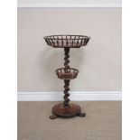 A 19th Century rosewood Occasional Table of two circular tiers with spindle gallery on spiral