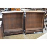 A pair of 19th Century mahogany open fronted Bookcases with pierced brass gallery and inset gilt