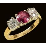 A Ruby and Diamond three stone Ring claw-set round ruby, 1.19cts, between two brilliant-cut