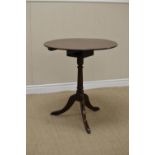 A Georgian mahogany Pillar Table with circular top on bird cage support turned column and tripod