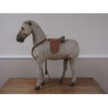 An antique skin covered pine toy Horse A/F, 1ft 11in x 1ft 11in