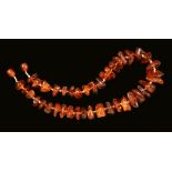 An Amber Necklace consisting of irregular graduated beads, approx 53 gms