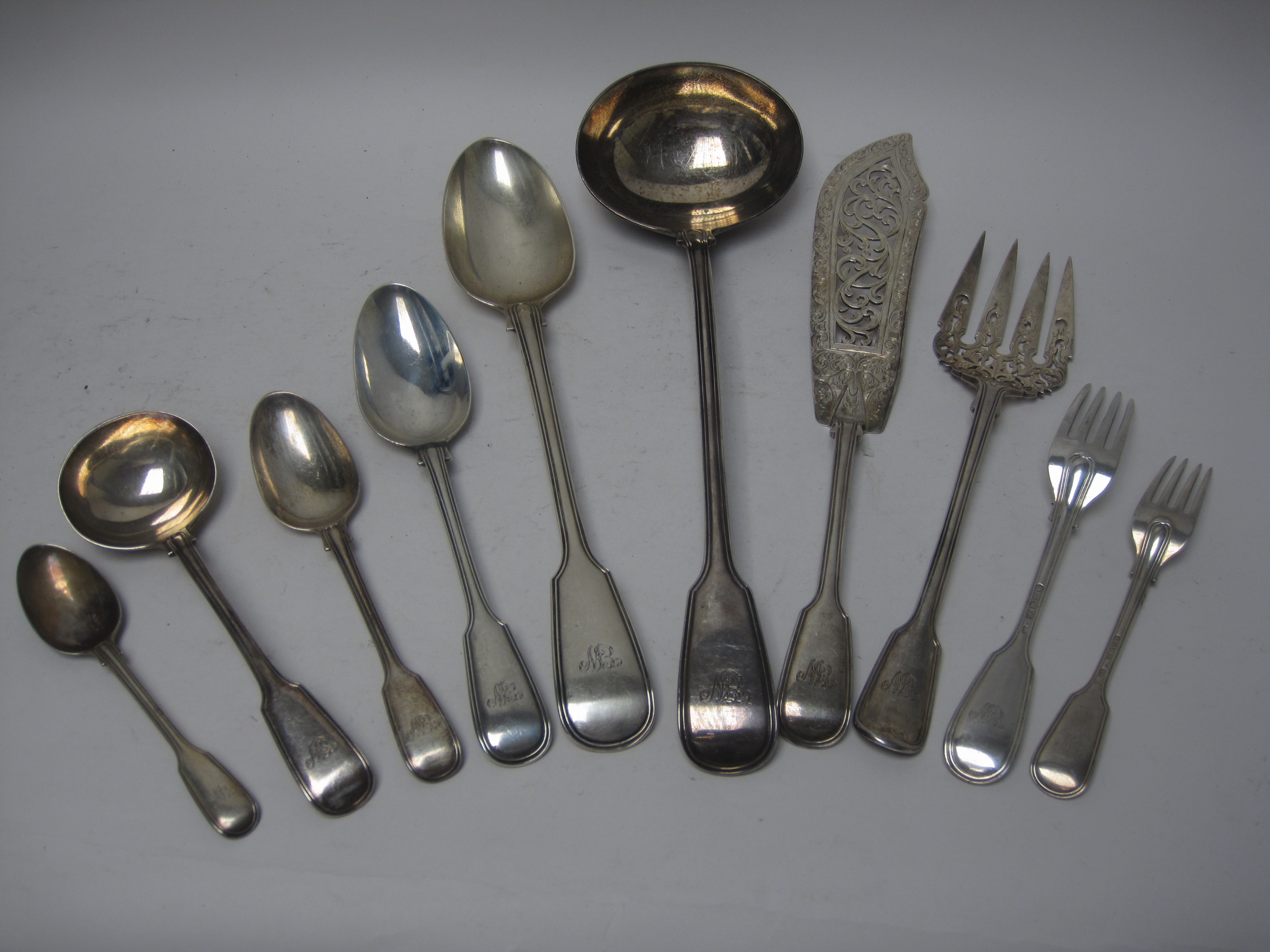 A matched set of Victorian silver Cutlery, fiddle and thread pattern engraved initials E.W.,