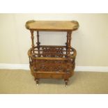 A Victorian burr walnut Canterbury with shaped oval top having pierced gallery, satinwood scroll