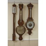 A 19th Century banjo Barometer and Thermometer with shell inlay, a Stick Barometer, and an Aneroid