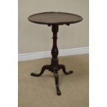 An 18th Century oak Pillar Table with dished circular top on turned column and tripod base, 1ft 8in