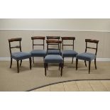 A set of six early 19th Century mahogany Dining Chairs with curved bar backs, blue upholstered stuff