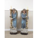 A pair of 19th Century French Ecclesiastical Pricket Candlesticks supported by Angels, all painted
