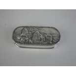 A 19th Century silver Snuff Box, the lid embossed with ruins, probably Dryburgh Abbey, Scotland,