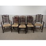 A set of eight 19th Century ladderback Dining Chairs with re-rushed seats on turned front legs