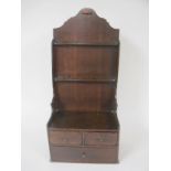 An 18th Century Spoon Rack, the base fitted two short and one long drawer, 2ft H